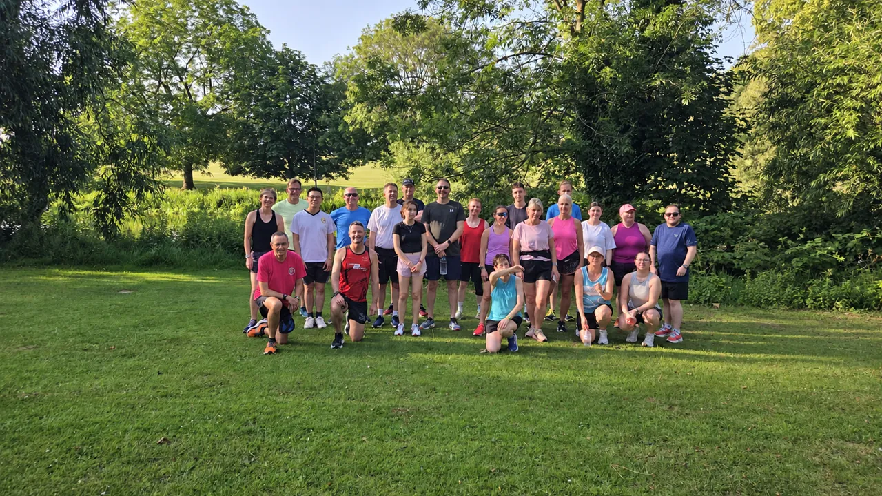 A large, welcoming group of CRWC members together in a Cheltenham park
