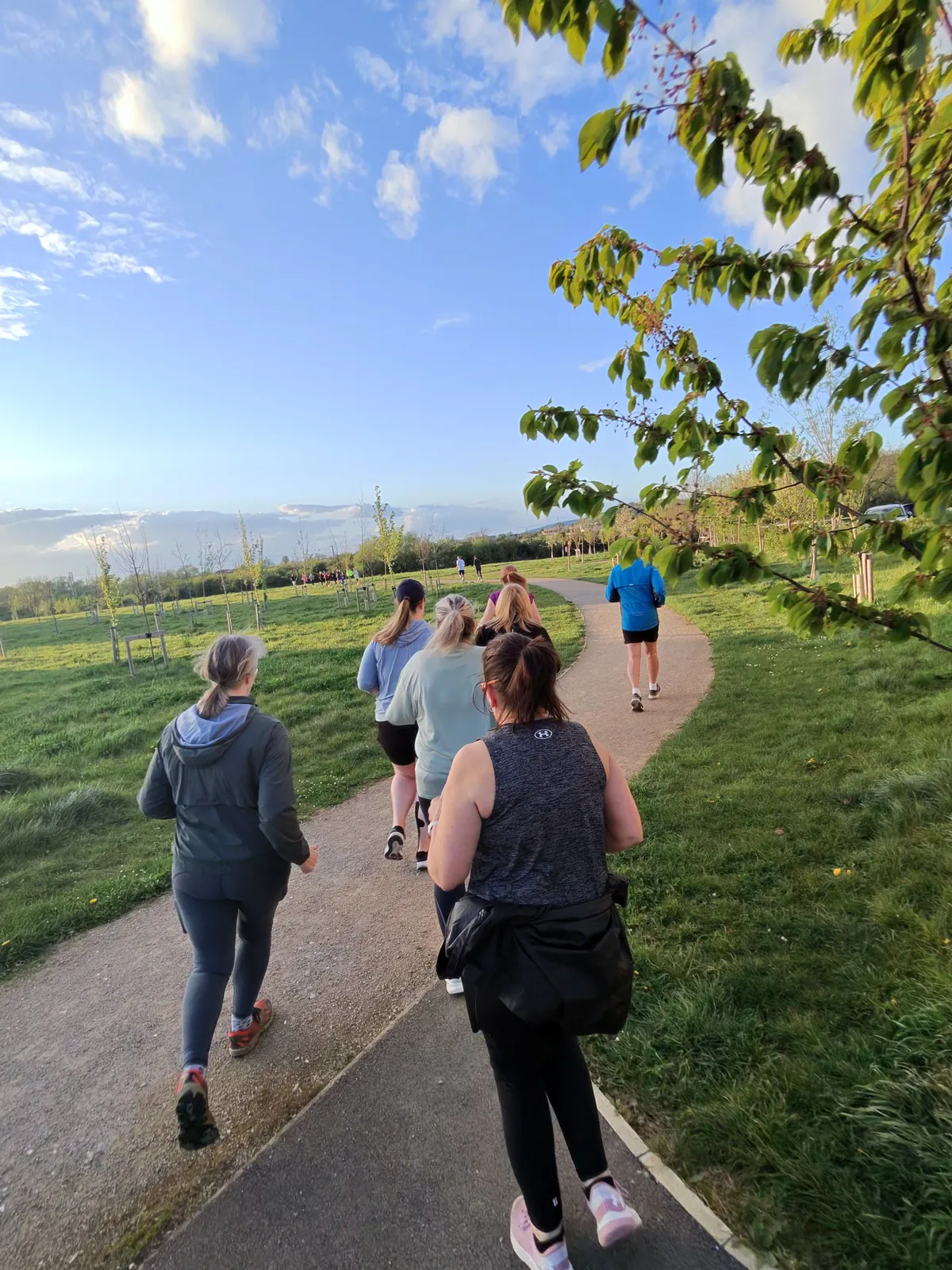 A CRWC Beginner Running group training together in daylight
