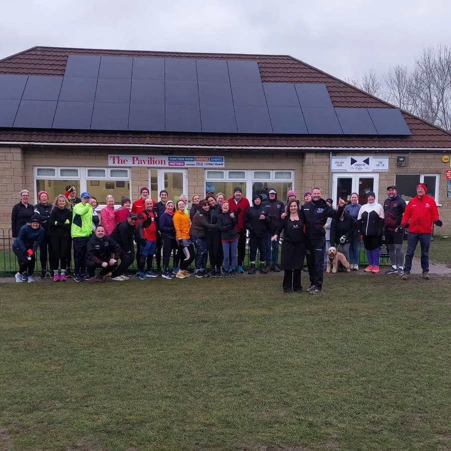 CRWC runners gathered outside the Pavilion and Whiskers Café in Prestbury